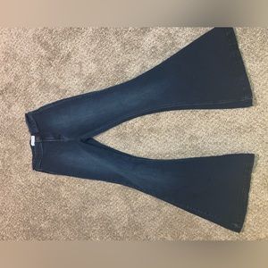These are original kancan bell bottoms. They are a dark wash. Good condition